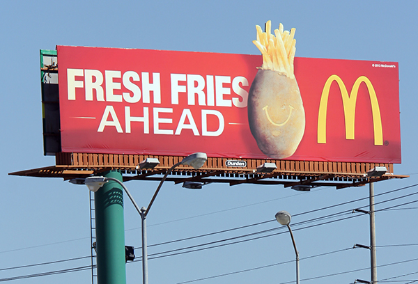 A Macdonalds restaurant billboard