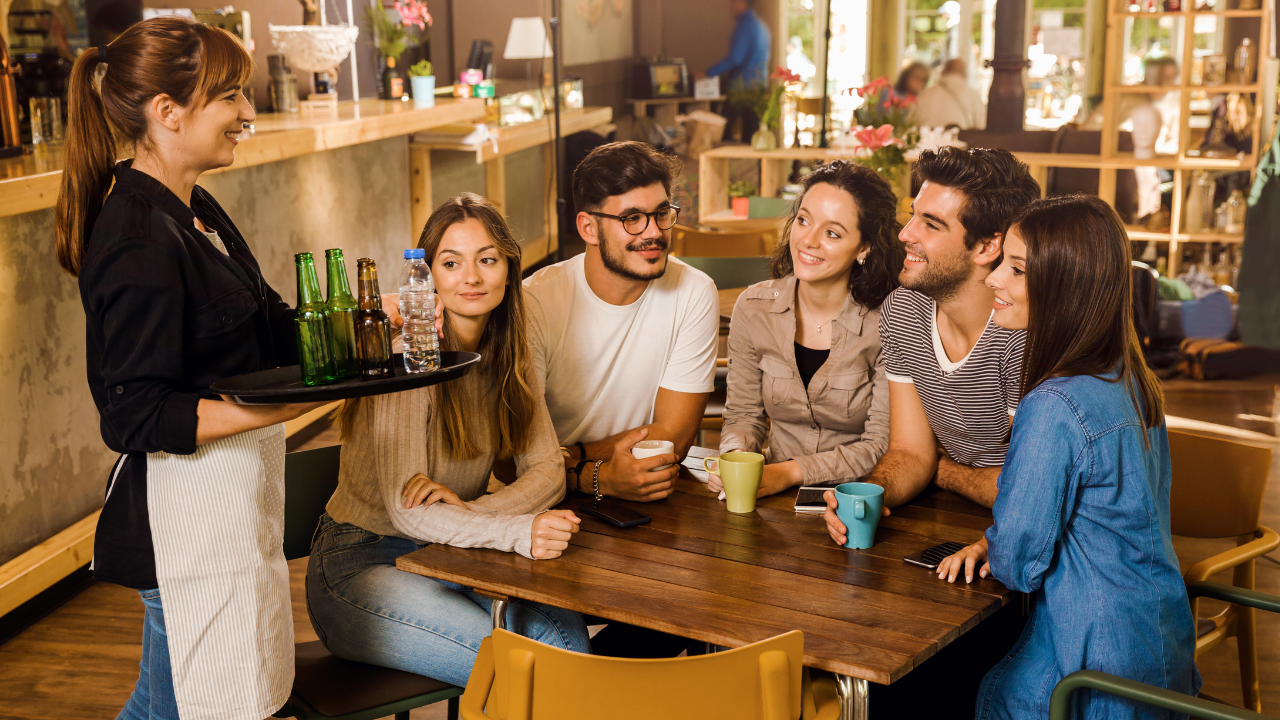 serving beer to restaurant guests