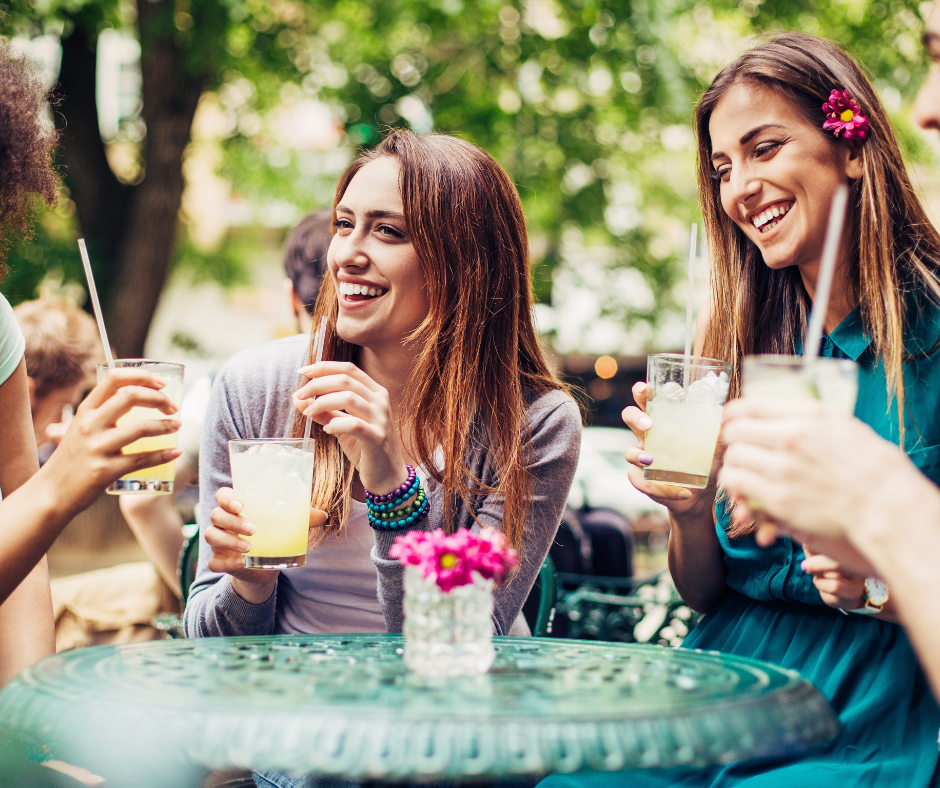 girls enjoying drinks on a spring day