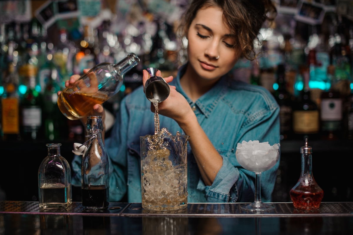 Bartender mixing drinks