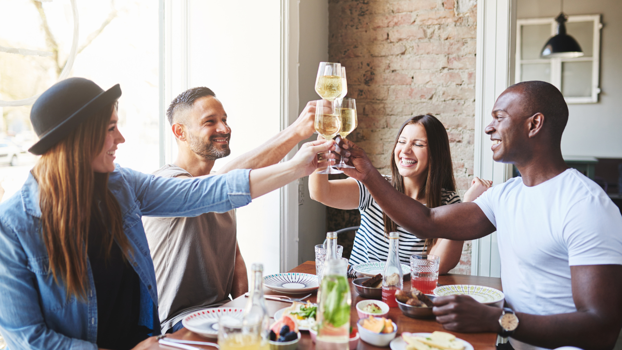 restaurant guests enjoying wine