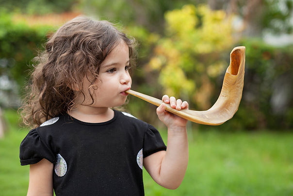 little girl shofar Jewish High Holidays