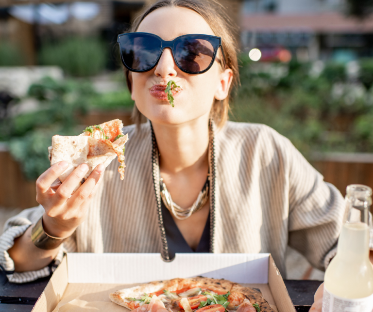 TikTok Influencer eats pizza outside
